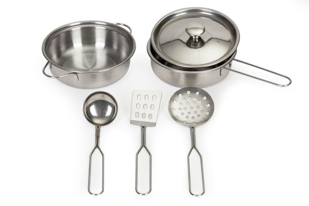 4. Set of five metal kitchen accessories including pot, frying pan with lid, spatula, strainer, and pasta spoon