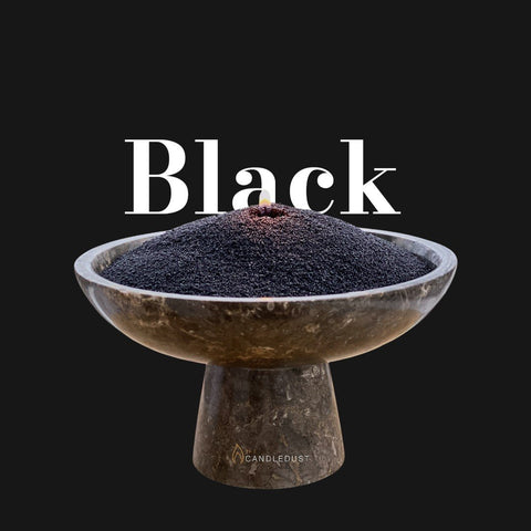 3. Close-up of black powdered candle sand in a decorative bowl with Candledust logo on black background