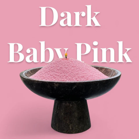 1. Dark baby pink powdered candle in black bowl with lit wick, text overlay