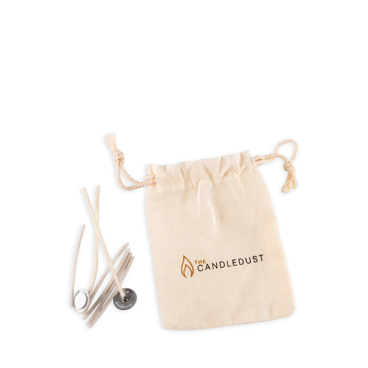 4. Candledust accessory kit with wicks and a beige drawstring bag featuring the brand logo