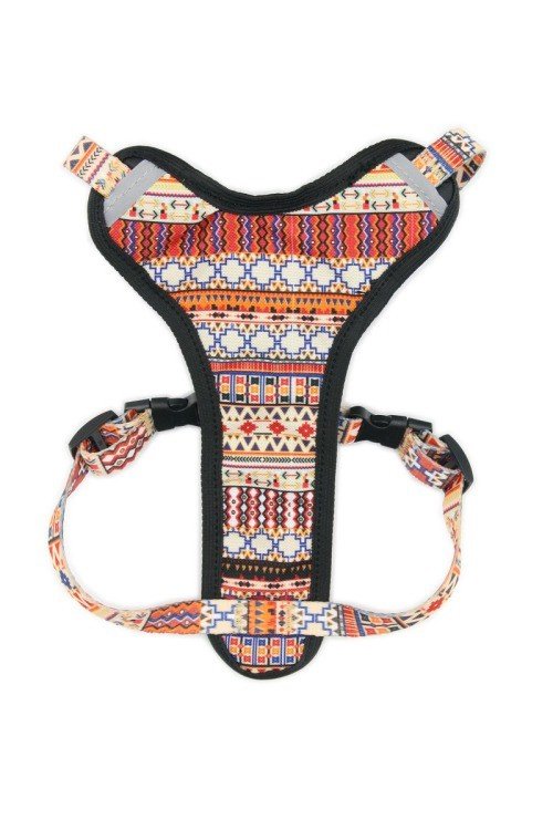 3. Flat lay of boho dog harness displaying vibrant geometric design and even pressure distribution padding
