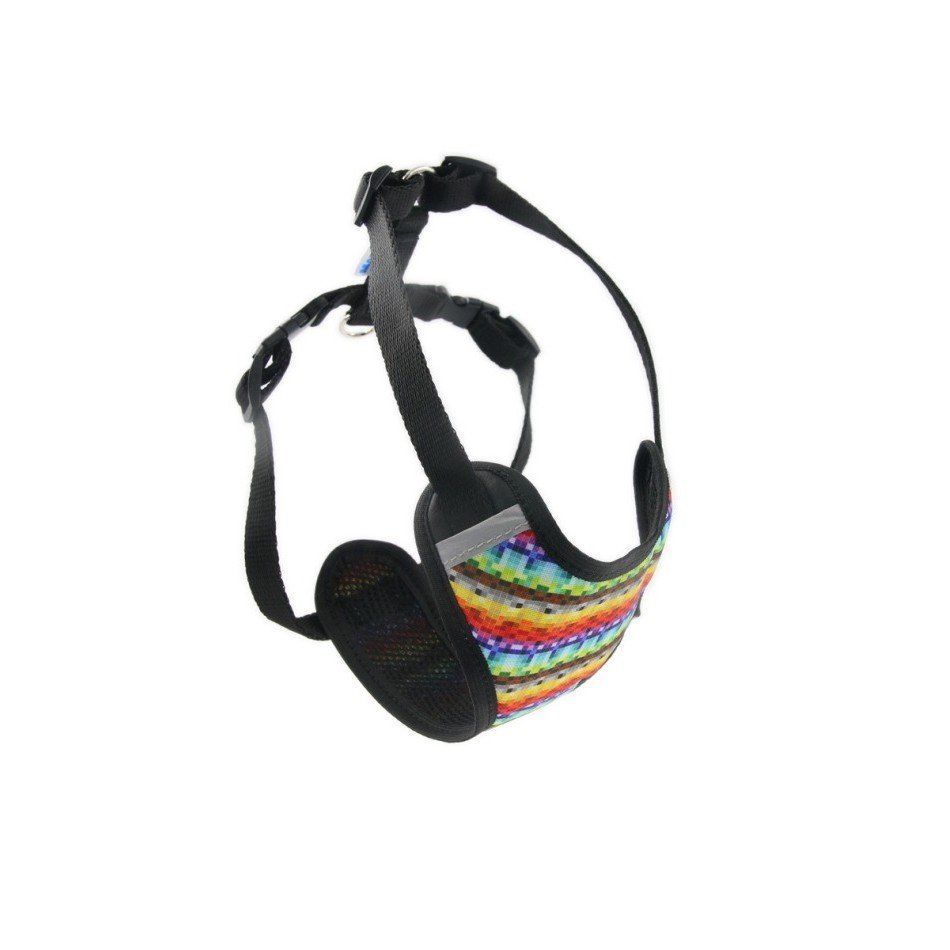1. Multi-colored dog harness with black adjustable straps and reflective elements, shown in a studio setting