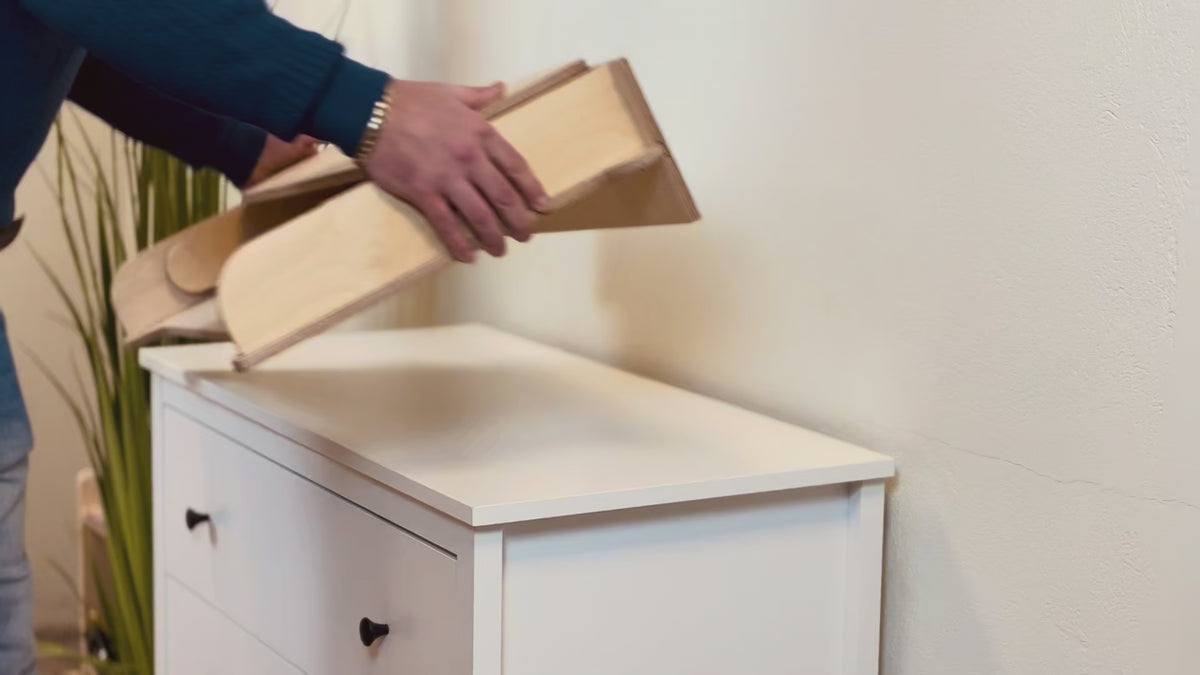 👶 Can a tabletop make 3am changes easier? Watch it set up in minutes. Smooth birch plywood, 79 cm wide, fits most dressers incl. popular IKEA. Non-toxic, sturdy, and made in Latvia for everyday peace. Sleepy nights deserve less clutter and more calm. Tap save for later and shop the Sale drop, link in bio. FamilyScl ChangingTable