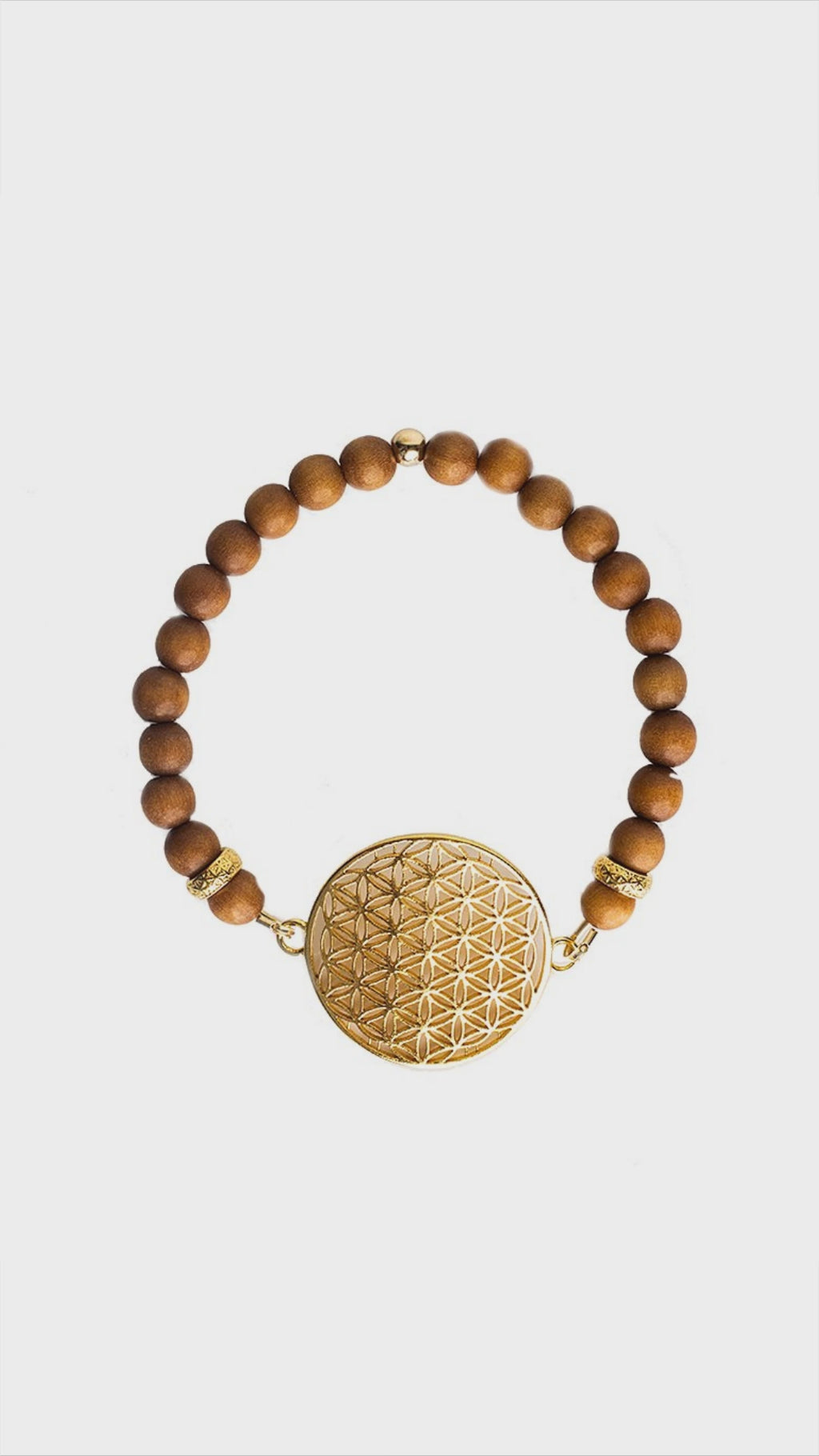 ✨ Ready to feel connected? Discover the beauty and balance of the Flower Of Life Bracelet. Designed with sandalwood and adorned in 925 silver and gold, every detail speaks elegance. Feel the allure of Estonia's craftsmanship wrapped around your wrist. This bracelet isn't just an accessory; it's an experience. Let it be your daily companion, a subtle whisper of positivity and connection. Don't miss out—this bestseller is a keeper. Dive into the serenity. Find the bracelet you deserve, link in bio