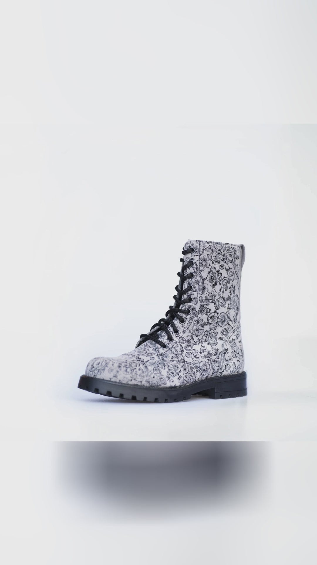🧐 Ready to turn heads? Discover the edgy charm of our Samelin 511 Gray Flower boots. Punk-style floral design meets top-notch practicality, making them your statement piece this season. Made with love and precision in Estonia, these boots balance style with durability. From water-repellent leather to an antibacterial insole, they're the ultimate fashion-forward choice. Step confidently into any scene—concerts, city strolls, or casual outings. Elevate your vibe with footwear that speaks your lan
