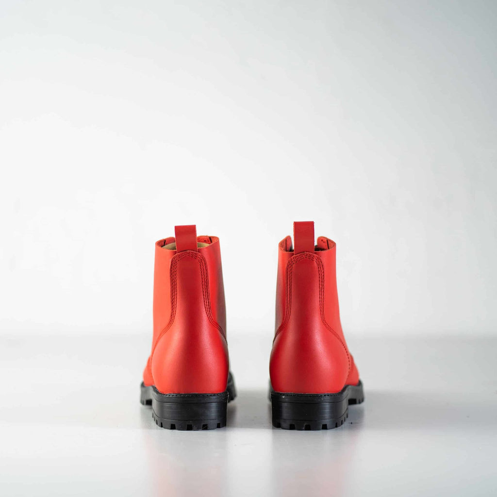 3. Back view of unisex red Aviator Boots by Samelin, showing sturdy construction and pull tabs