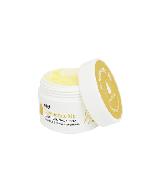 1. Woman holding Tilk! Regenerate Me Face Cream in a lifestyle setting, showcasing product use
