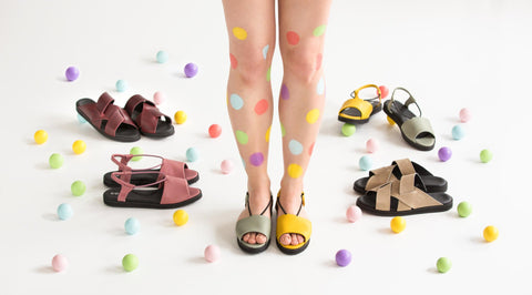 1. Women's yellow Berlin sandals by Omaking, styled with colorful polka dot background, showcasing vibrant summer footwear