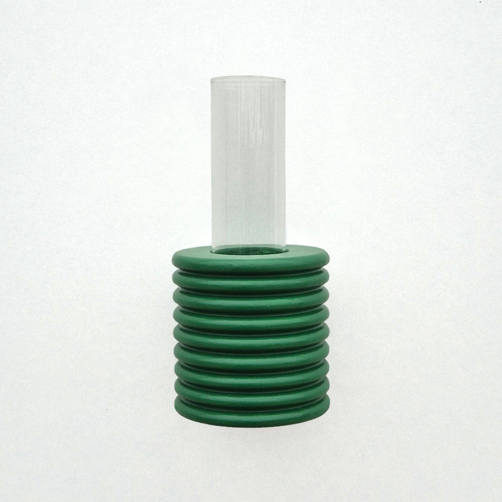 2. Studio shot of Ribble Wall Vase in green by 5mm Paper, highlighting beech wood and water-based paint finish