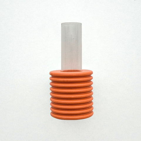 5. Studio image of Ribble Wall Vase in orange, showing beech wood texture and tube vase