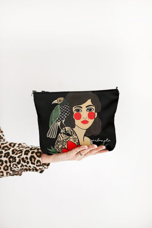 2. Garbanota Makeup Bag/Pouch Rose in Black with artistic print, held in hand, studio setting