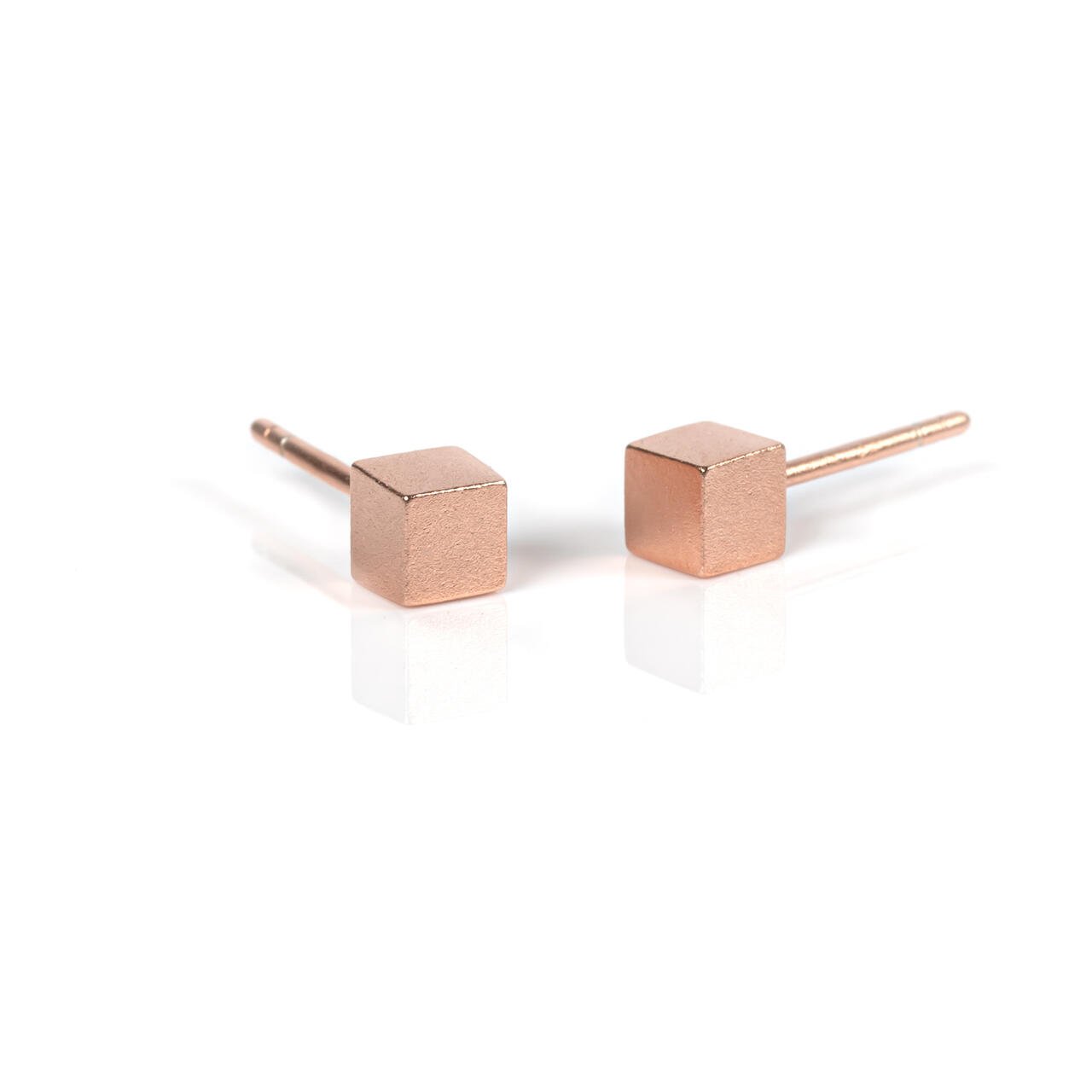 3. MyaMoon Satin Cube Earrings in rose gold, highlighting a sophisticated silky-matte finish