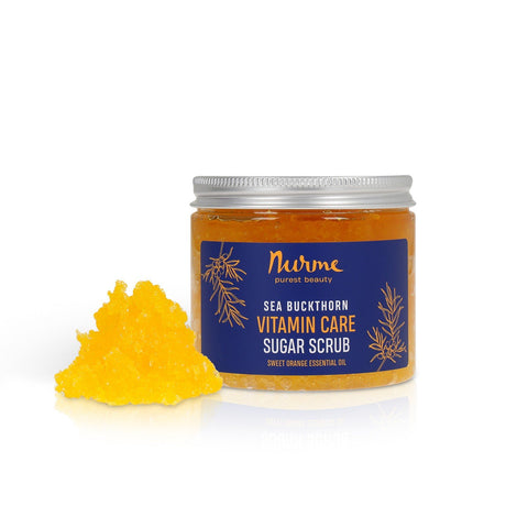1. Nurme Sea Buckthorn & Orange Sugar Scrub jar with vibrant orange scrub beside it on white background