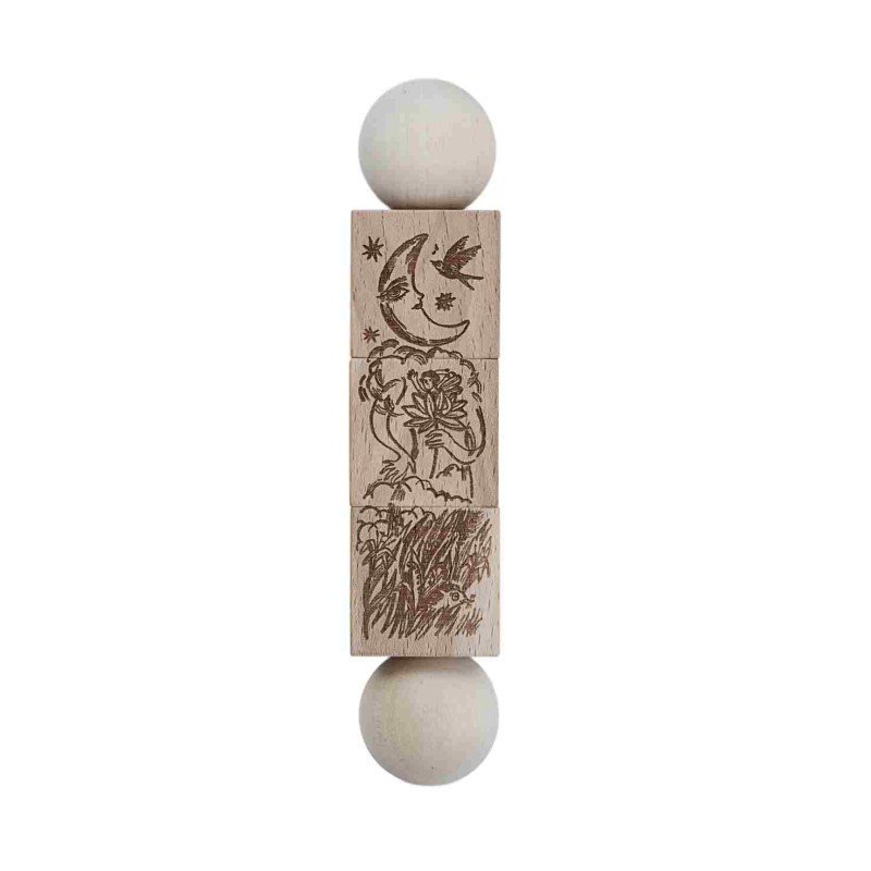 3. Close-up of natural wooden spinning puzzle with engraved illustrations inspired by 'The Secret Garden' and 'Thumbelina'