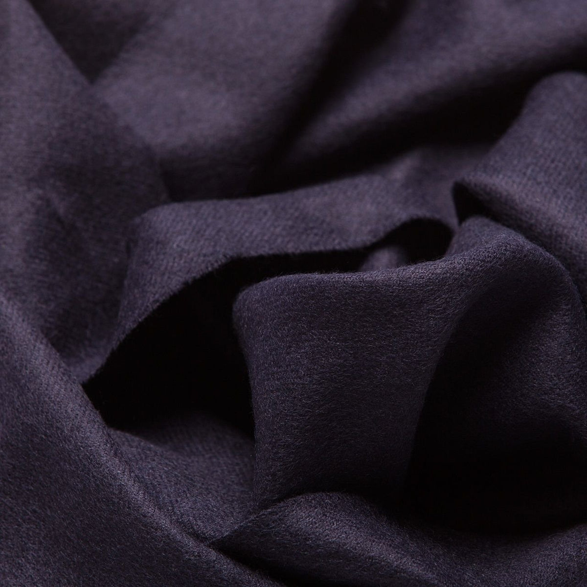 15. Close-up of Alpaka natural baby alpaca fabric in navy, showing texture and softness