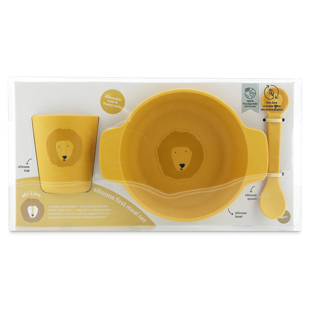 2. Packaged Trixie Baby Mr. Lion silicone meal set with cup, spoon, and bowl featuring lion face design, in clear box with product details