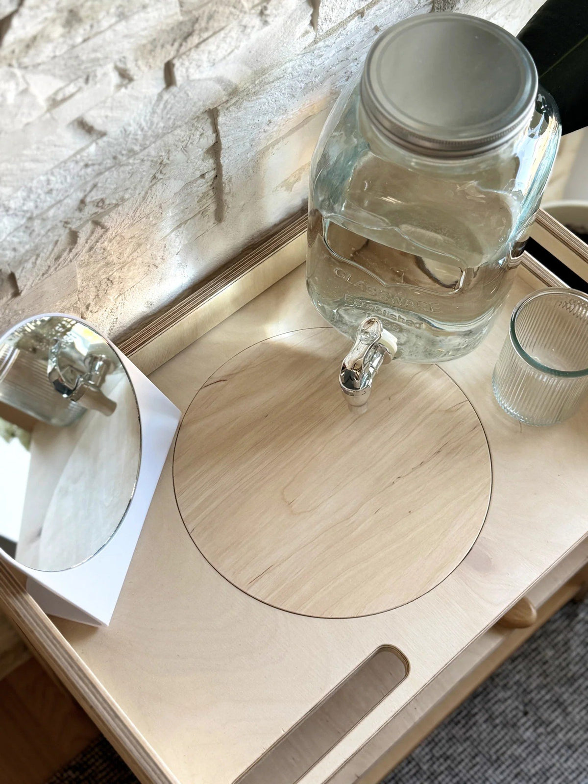 3. Top view of Montessori wash station with lid and water jar