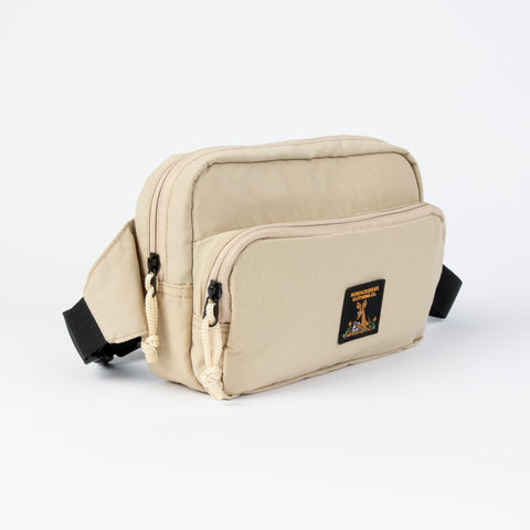 2. Beige Sniff Retro Waist Bag by Moomin with black strap and front pocket, studio background