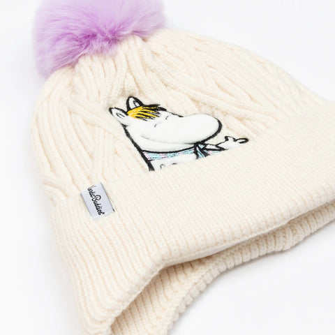 4. Flat lay of cream Snorkmaiden beanie with purple pom-pom and Moomin character embroidery, showing NordicBuddies label