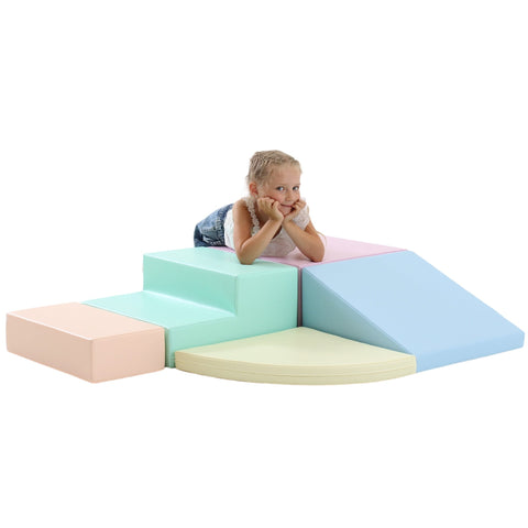 1. Child lying on IGLU pastel foam block set with steps and ramp in a playroom setting