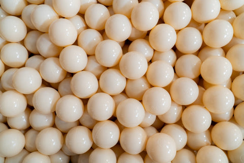 3. Close-up of beige soft play balls with smooth surface, ideal for children's ball pits, highlighting texture and color