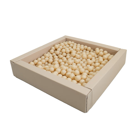 4. Flat lay of beige soft play balls in a square container, showcasing quantity and arrangement
