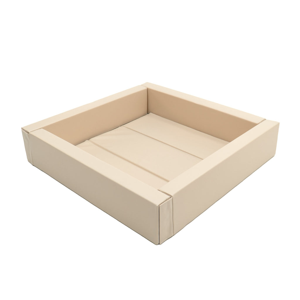 2. Empty beige IGLU soft play ball pit with clean white background