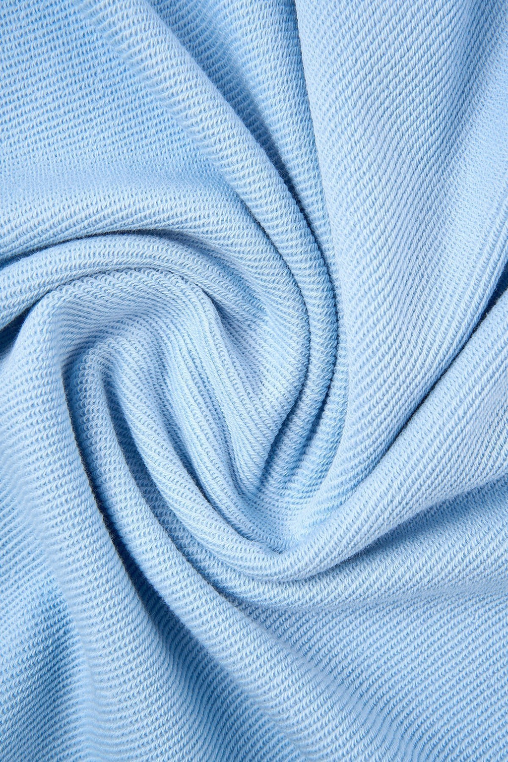 5. Close-up of light blue fleece fabric texture of Sossu sweatshirt