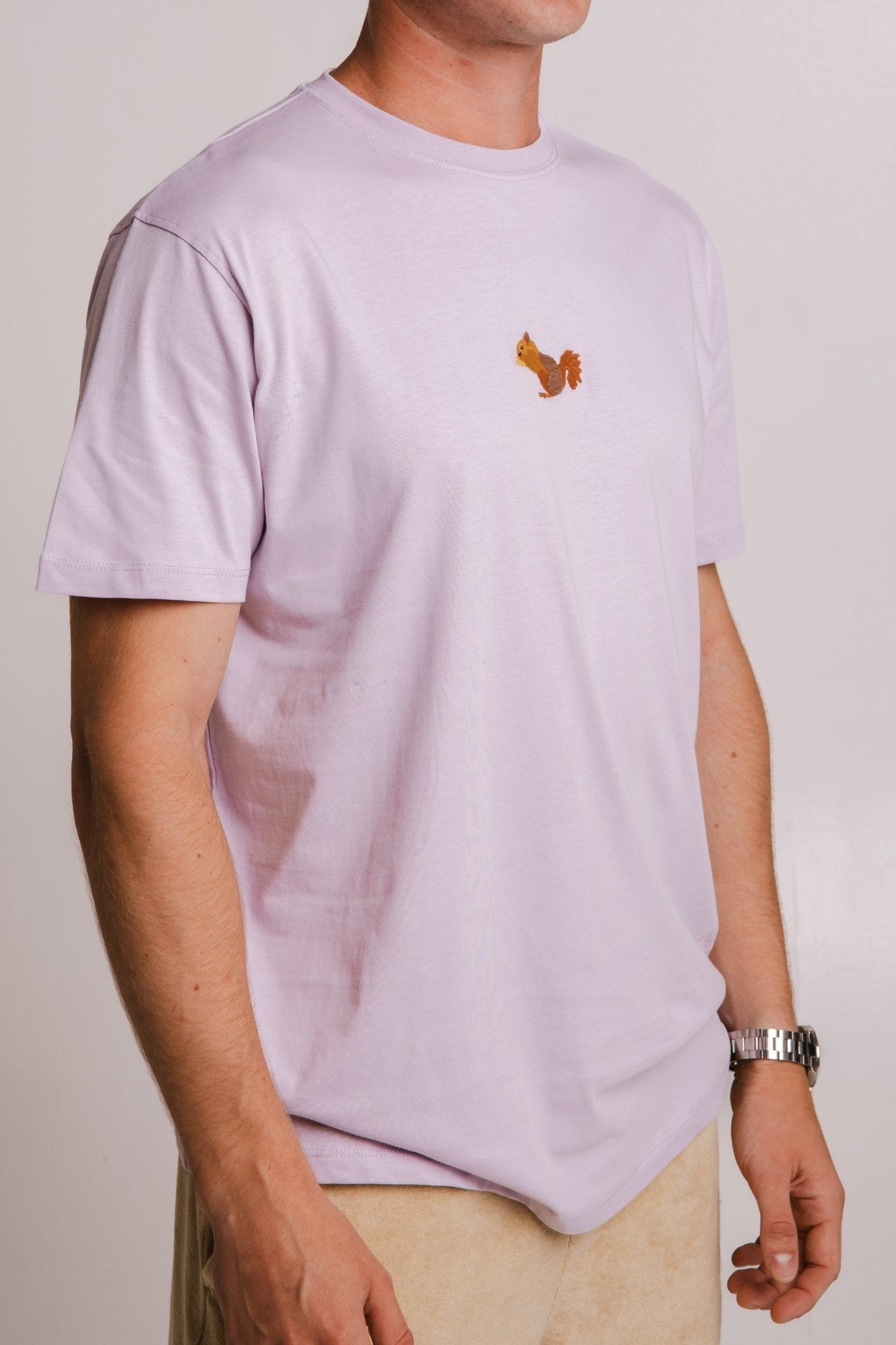 4. Side view of men's lilac Sossu Squirrel T-shirt, showing regular fit and embroidered design