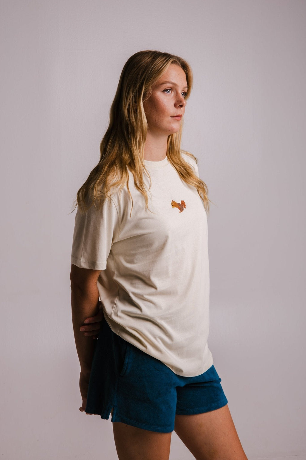2. Women's Sossu Squirrel T-shirt in Parchment, side view, studio setting