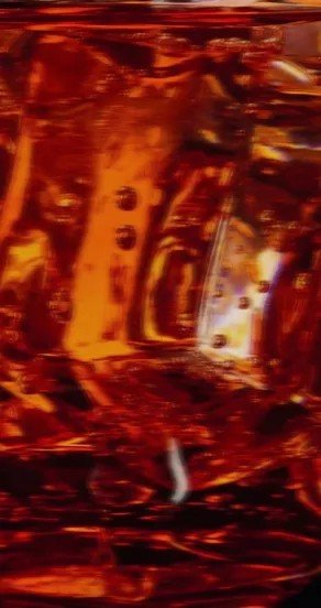 3. Close-up of amber liquid with light reflections