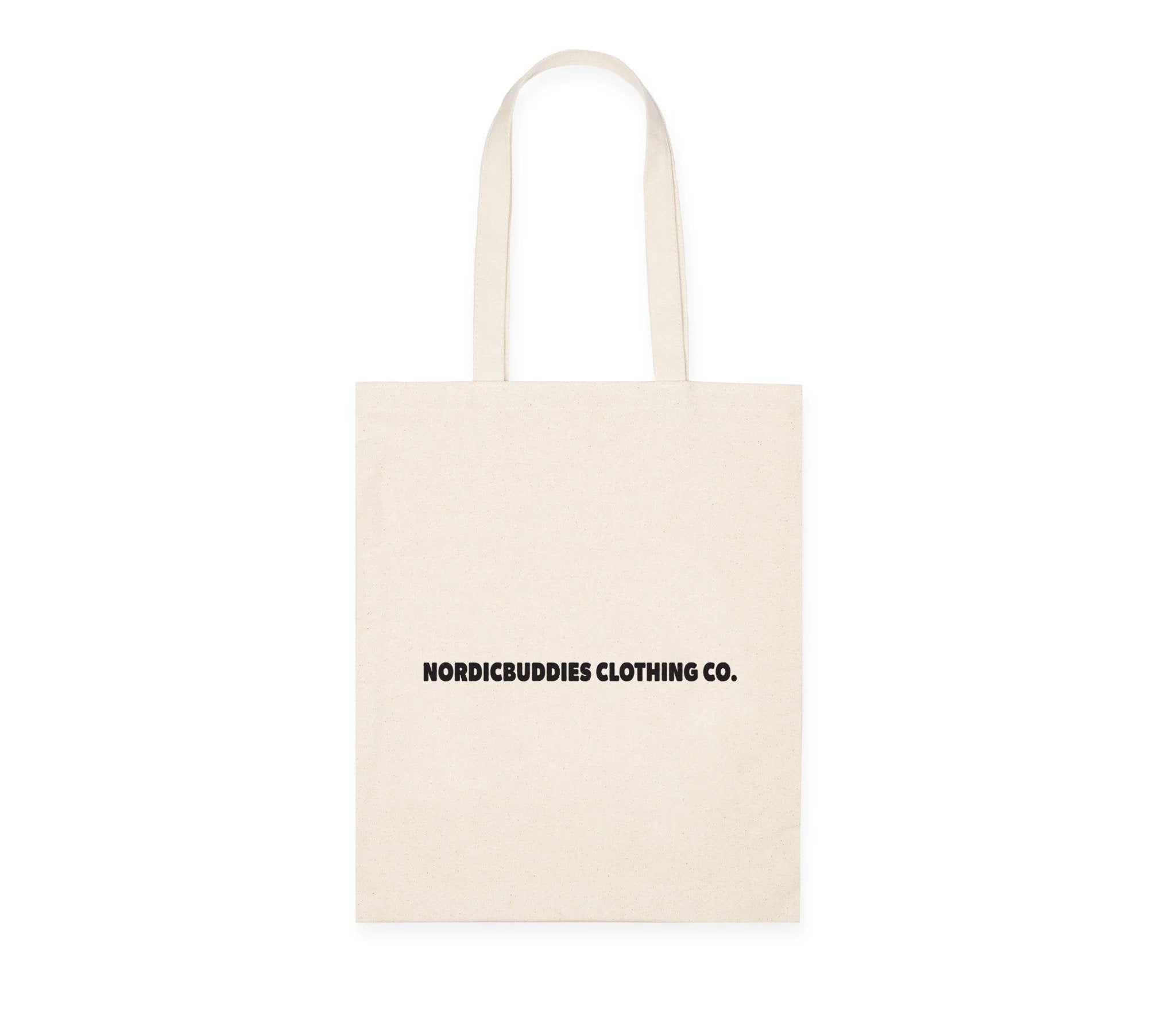 2. Back view of beige Stinky Plotting Tote Bag with NordicBuddies Clothing Co. text, made from 100% heavy cotton, shown in studio