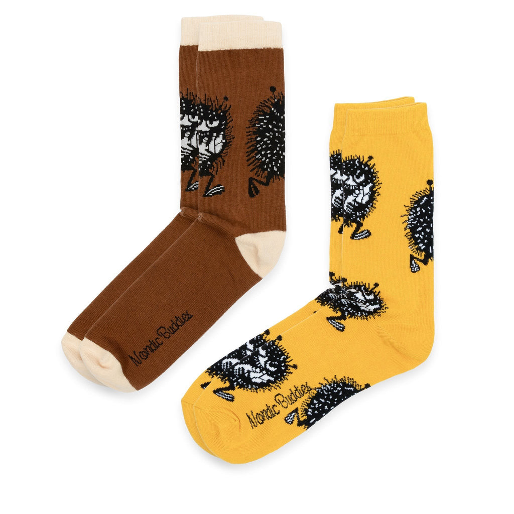 3. Two pairs of socks, one brown and one yellow, featuring Moomin Stinky character and NordicBuddies logo
