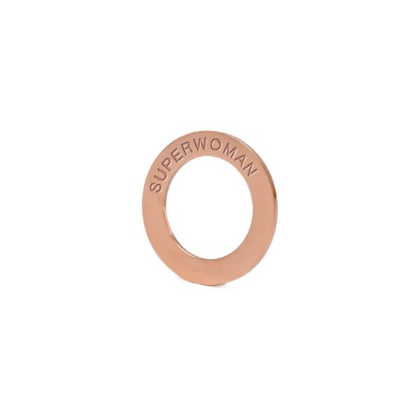 4. Close-up of rose gold-plated stainless steel ring engraved with 'SUPERWOMAN' from Olla Silk Ribbon Bracelet