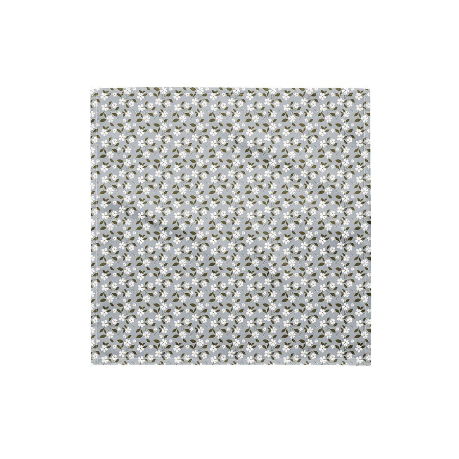 4. Flat lay of Flowery Stories bandana with symmetrical white blossom pattern on grey background, showcasing full design