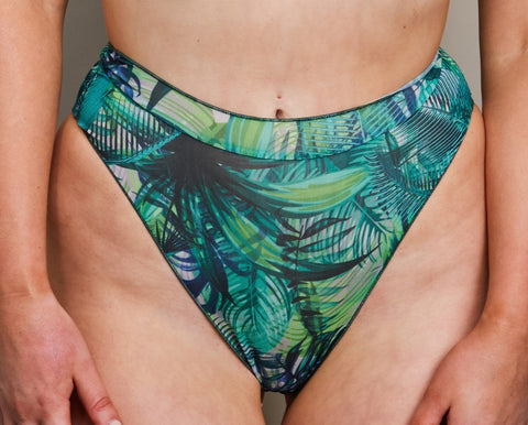 2. Close-up of women's tropical palm green high-waisted bikini bottoms by SWIMSARA