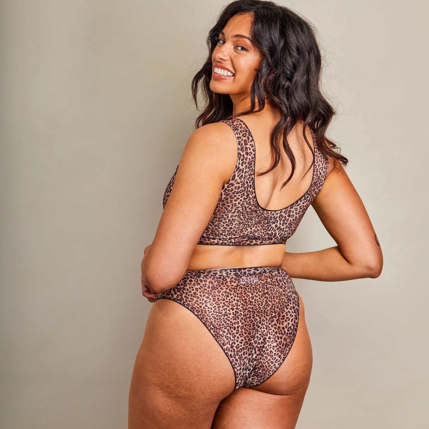 2. Women's Tan Through Crop Top Bikini Set in Mini Feline print by SWIMSARA, back view in studio