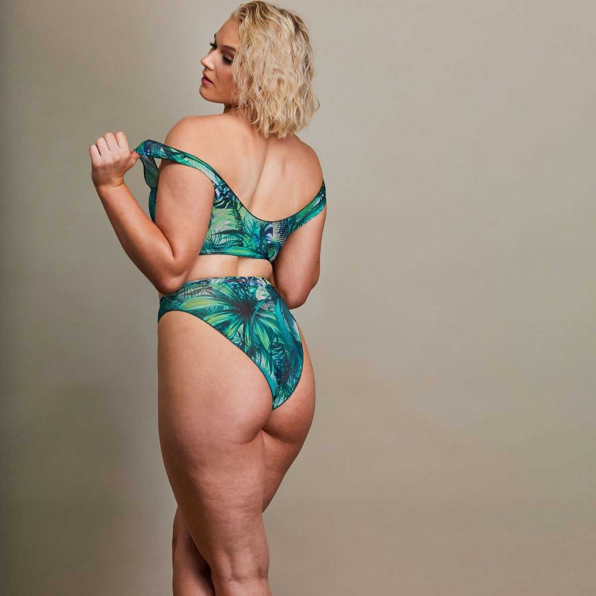 3. Back view of Women's Tropical Palm Green Tan Through Bikini Set by SWIMSARA, model in studio