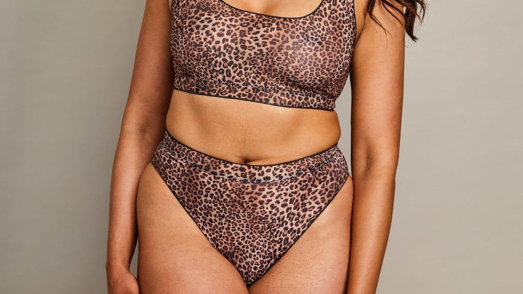 4. Front view of women's high-waisted bikini set in mini feline print by SWIMSARA, studio shot