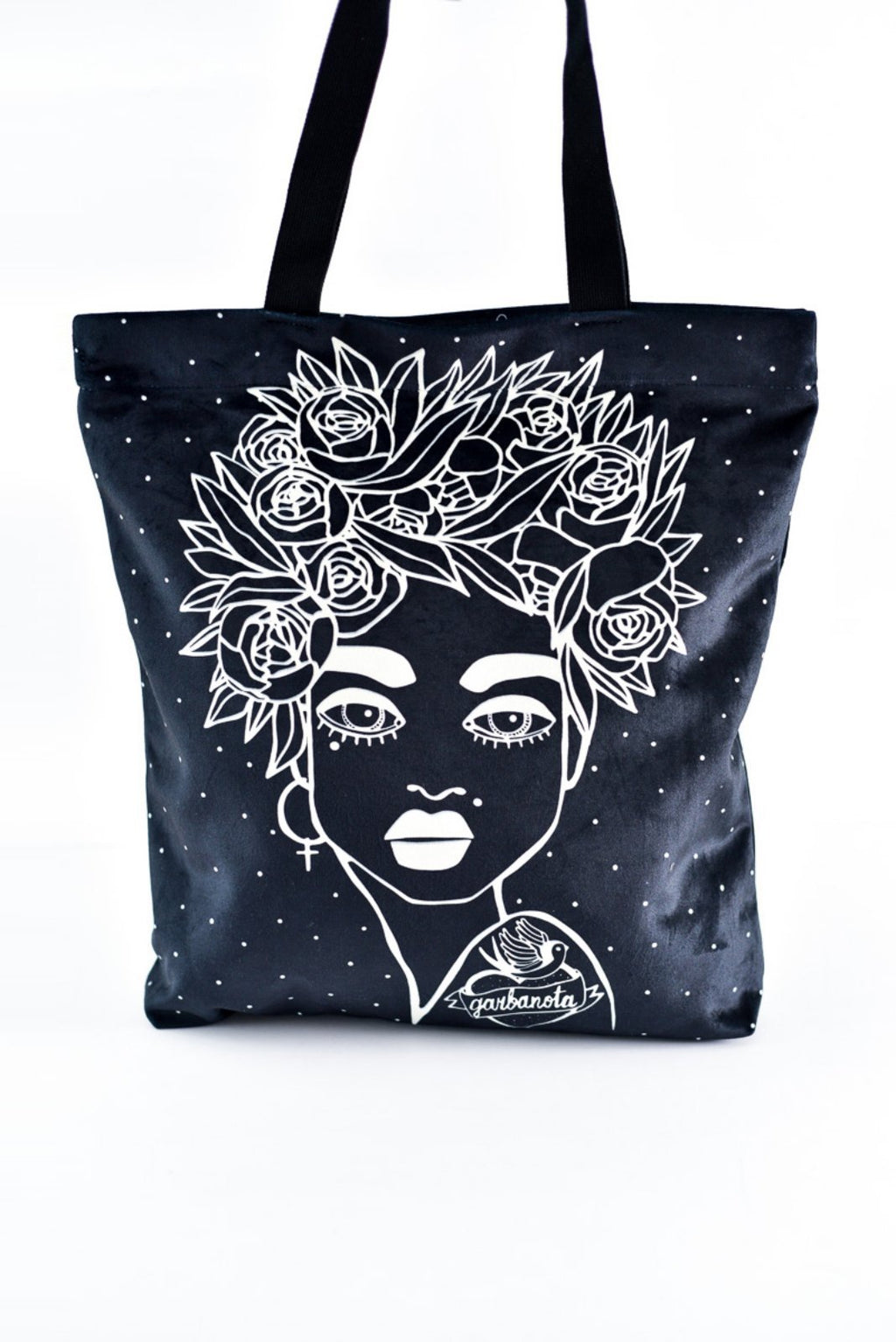 7. Studio shot of Garbanota Naomi handbag in black with floral haircut design, highlighting artistic pattern