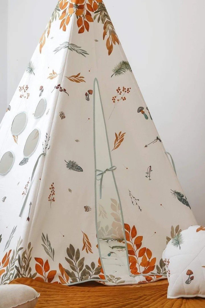 8. Side view of teepee tent with forest pattern and circular windows