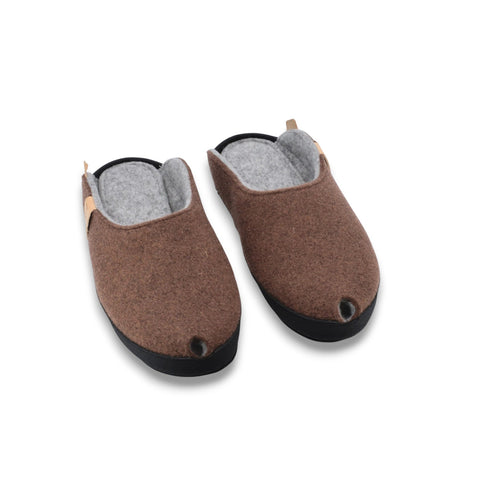 2. Pair of brown lambswool felt slippers with grey lining, front view highlighting rounded toe and black sole