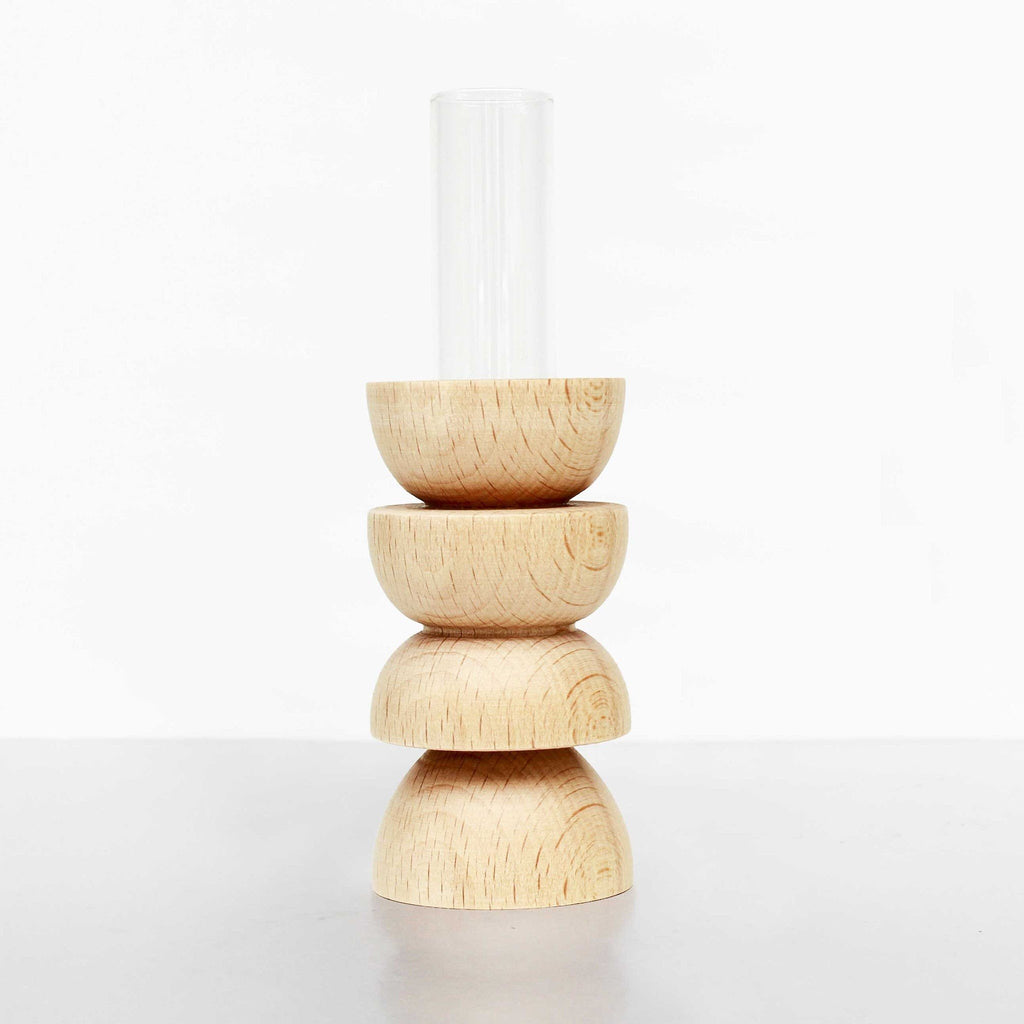 3. Studio image of Totem Wooden Vase - Medium Nº 4 by 5mm Paper, highlighting beech wood base and removable glass tube