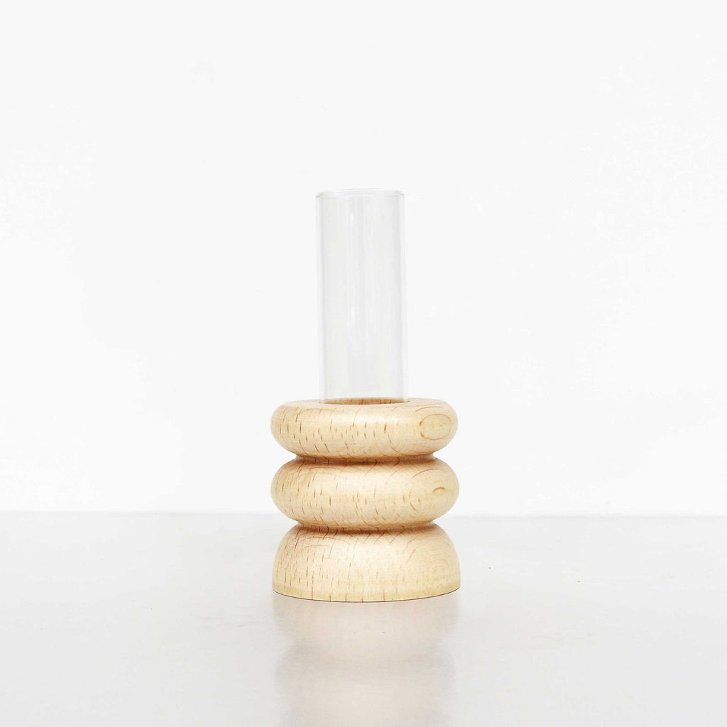 4. Studio shot of Totem Wooden Vase - Short Nº 1 by 5mm Paper showing beech wood base and glass tube