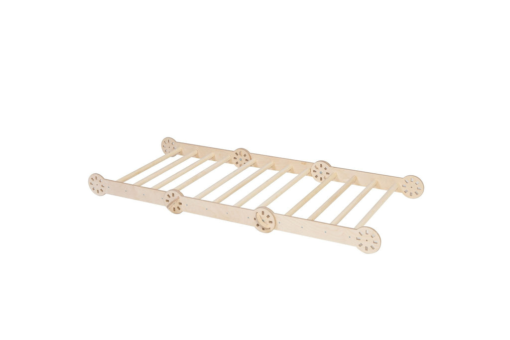 2. Studio shot of transformable Montessori climber in natural wood finish, shown flat on a white background