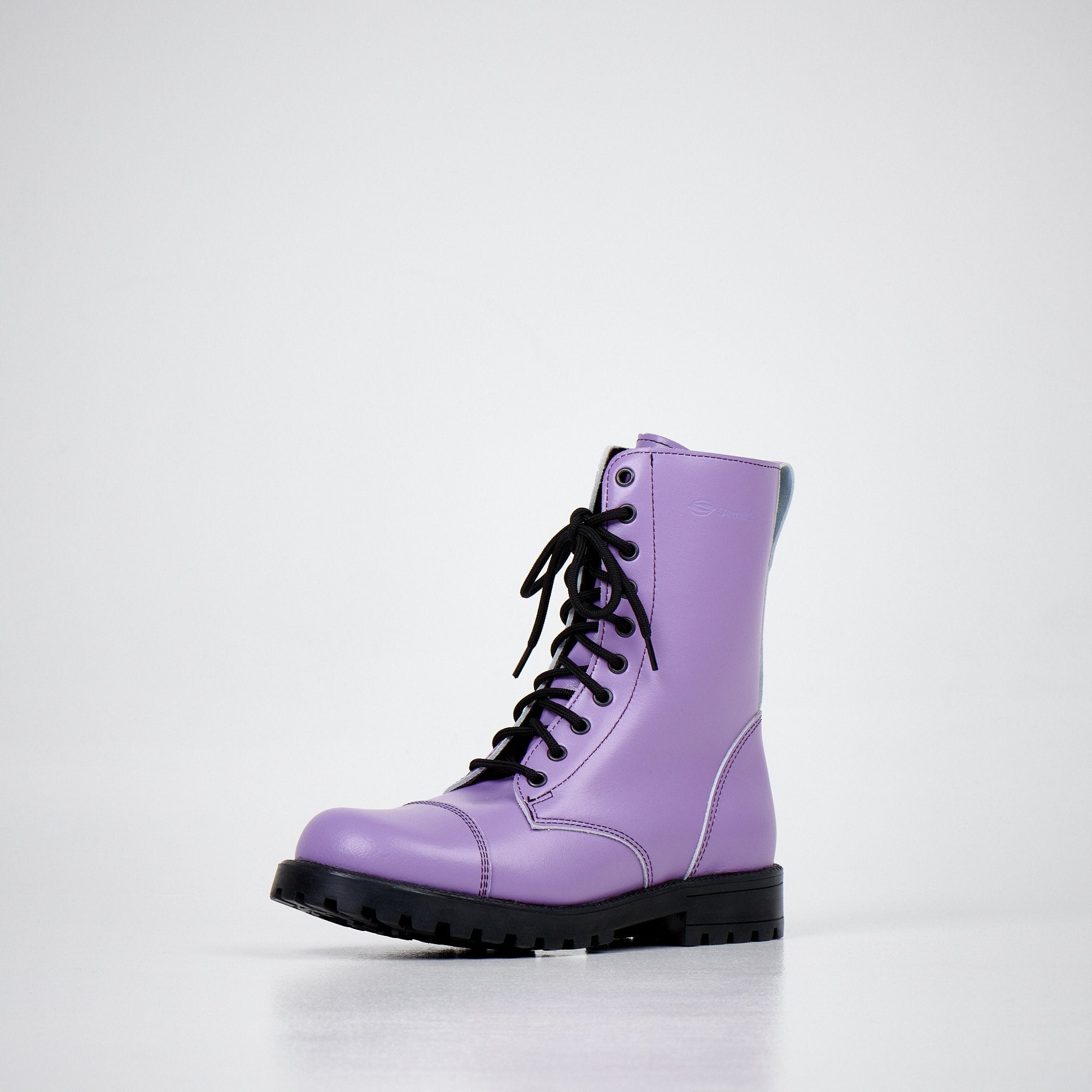 4. Front angled view of women's Samelin 511 Purple boots with black laces in studio