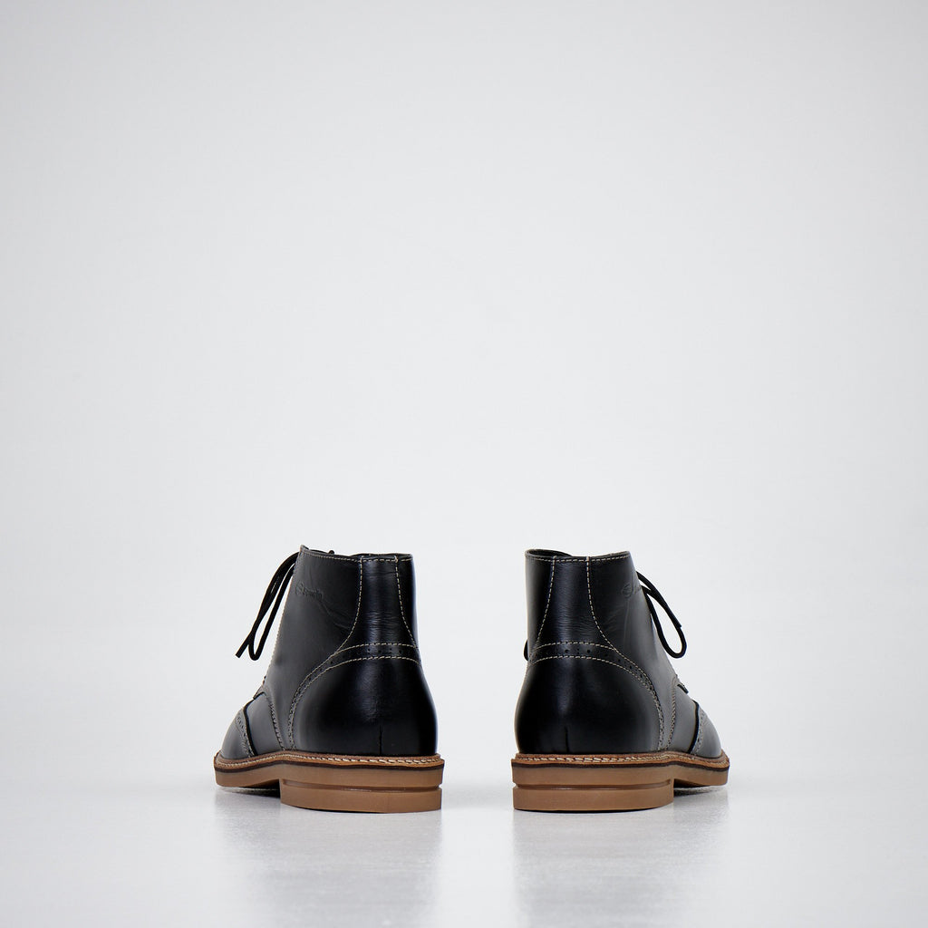 3. Back view of men's dark brown ankle boots by Samelin, highlighting non-slip rubber sole and leather detailing
