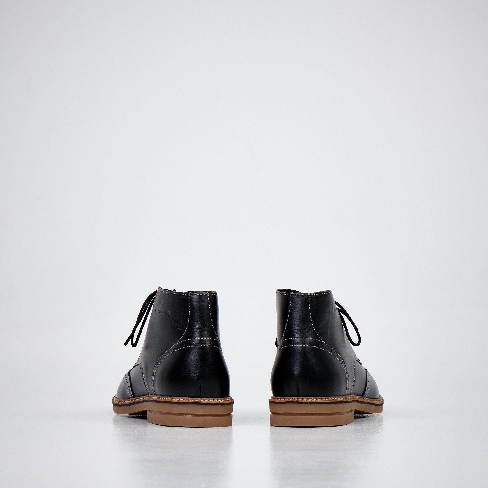 3. Back view of men's dark brown ankle boots by Samelin, highlighting non-slip rubber sole and leather detailing