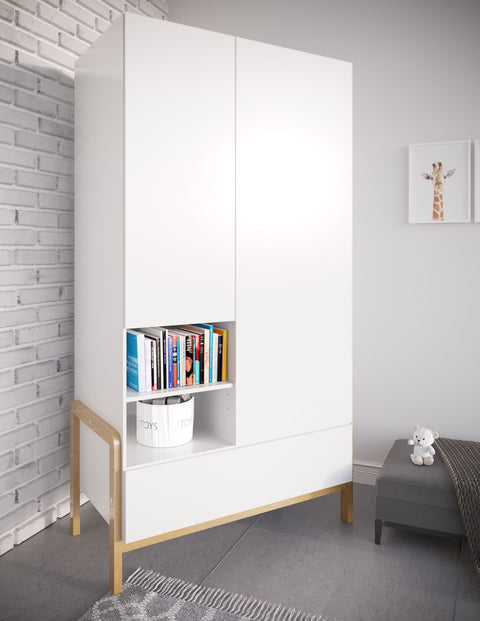 1. Kocot Kids Victor wardrobe in a child's room with books and toys on shelves