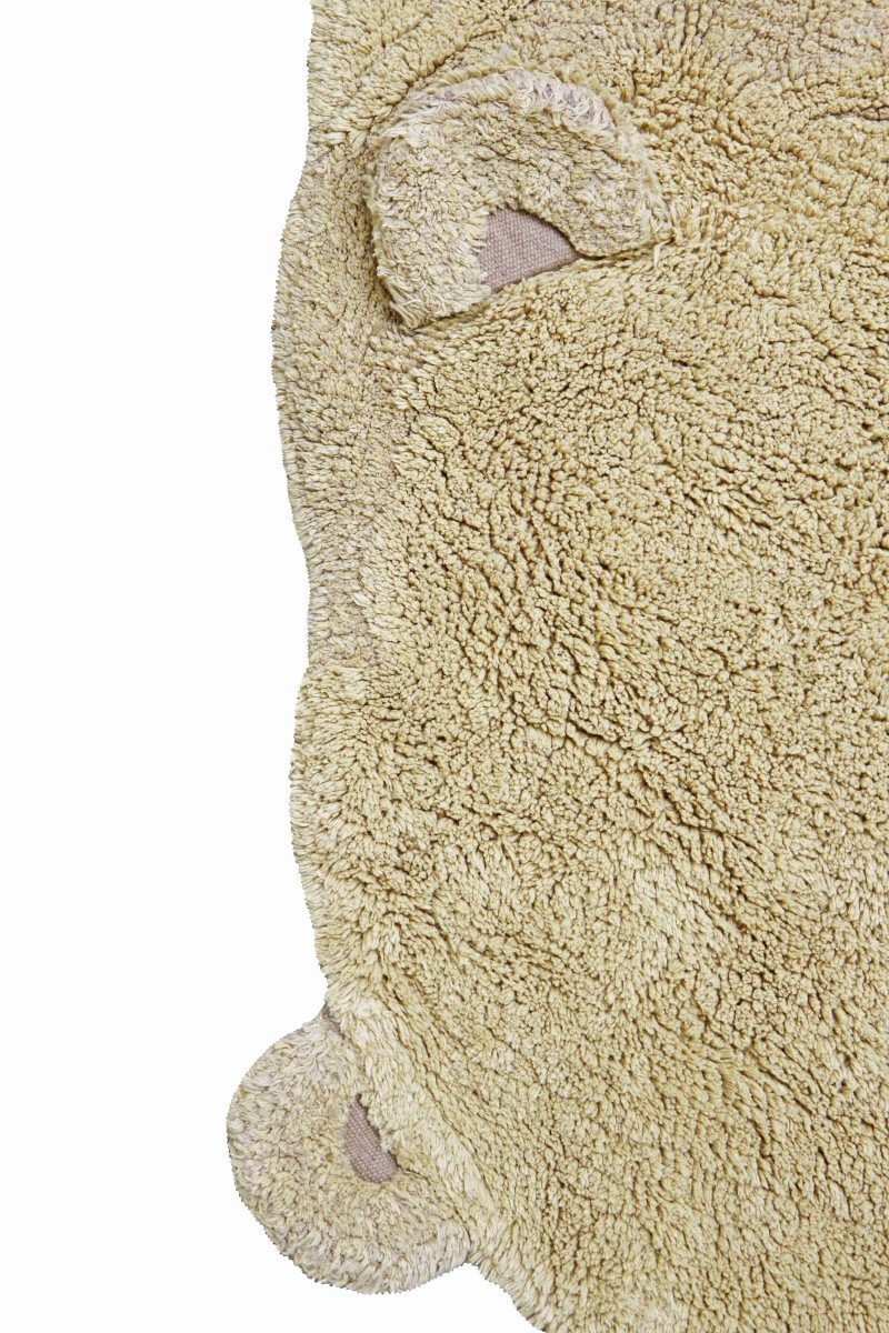 9. Detail of teddy bear rug's edge and texture
